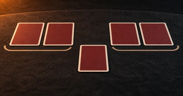 Two pairs of face-down cards and a single card between them